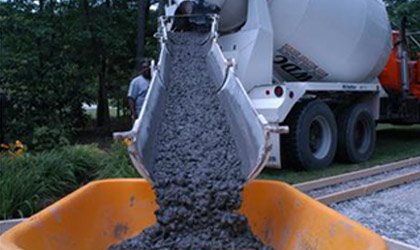 Ready mix concrete being poured from a transit mixer