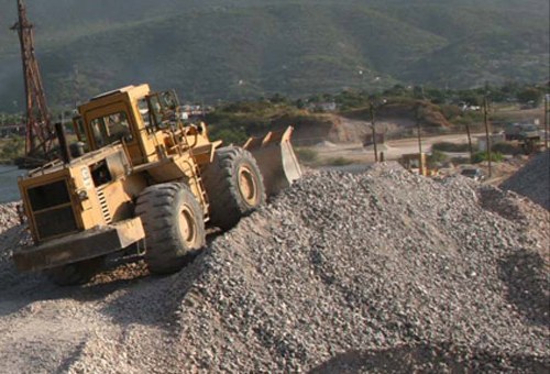 Loader and crushed aggregates at a CEMTEC quarry site